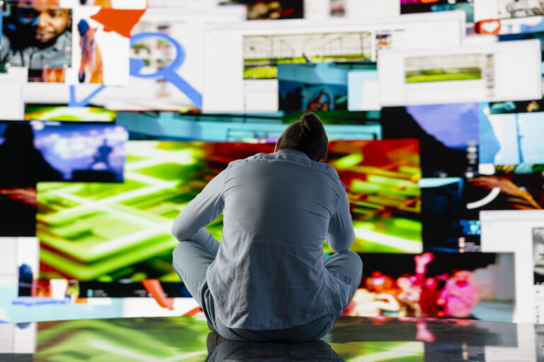 Visibly affected guy suffers from social anxiety due to excessive information