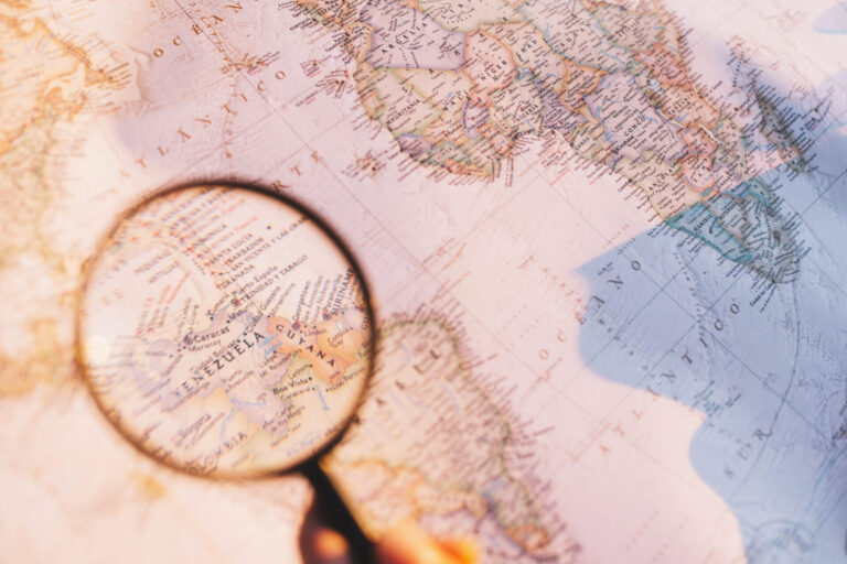 crop-person-exploring-map